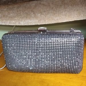 Sondra Roberts silver clutch w strap